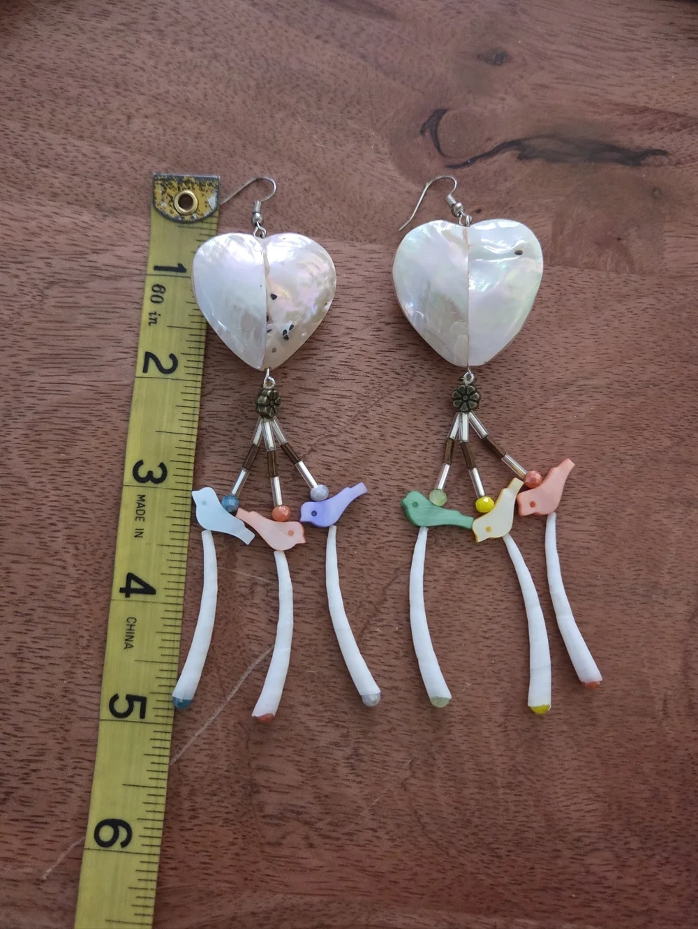 Handmade Native heart earrings with bird and flower shell details boho festival